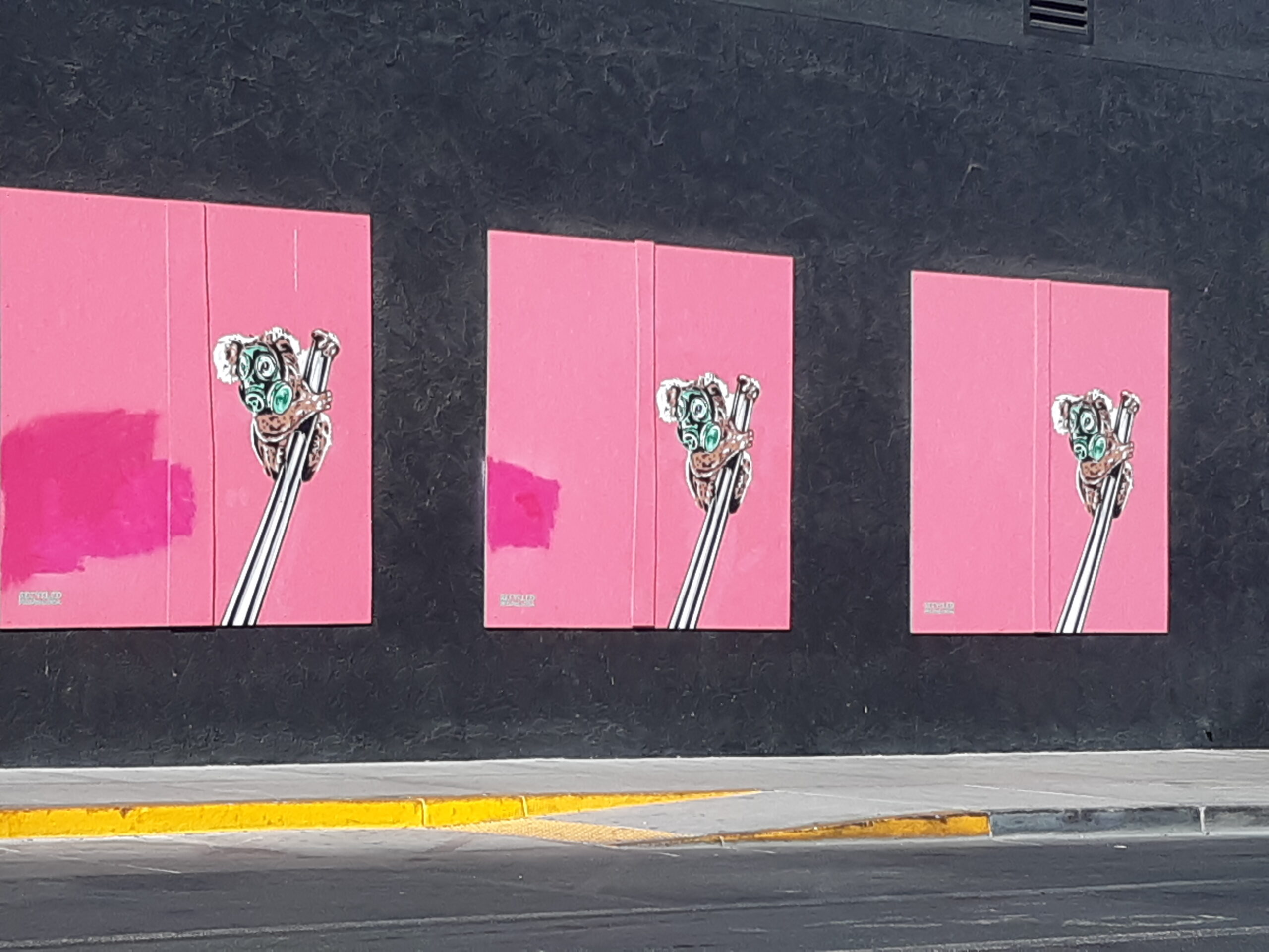 3 pink koalas in vegas corner across from el cortez & fremont